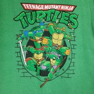 Teenage Mutant Ninja Turtles Size L. Sewer Shirt